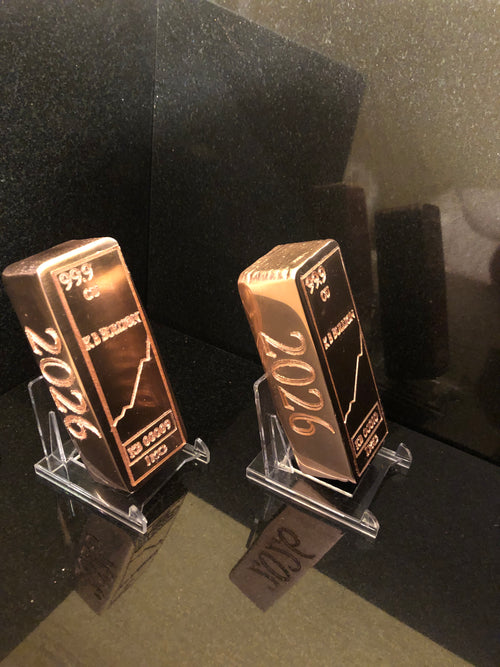 KB Bullion 1kg 99.9% pure copper bar 2026 Edition, hand poured, mirror polished, on display stand